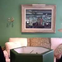 a man and a woman wearing character hats and facing each other